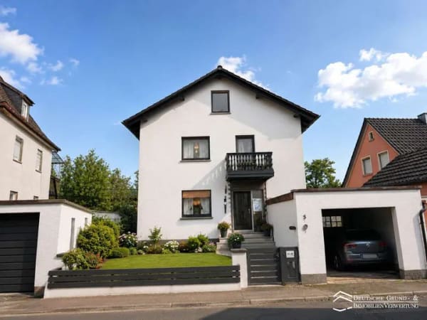 Immobilie in Gemünden am Main - MFH mit Garage und Garten sowie fortschrittlicher Heizungsanlage - Bild 0