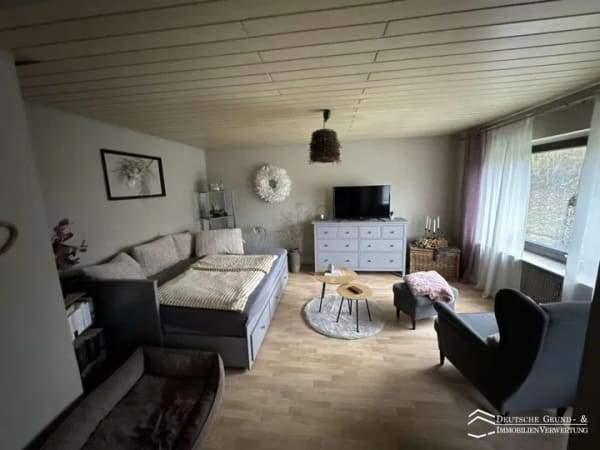 Immobilie in Gemünden am Main - MFH mit Garage und Garten sowie fortschrittlicher Heizungsanlage - Bild 1