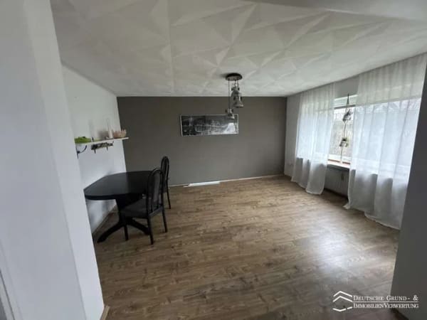 Immobilie in Gemünden am Main - MFH mit Garage und Garten sowie fortschrittlicher Heizungsanlage - Bild 3