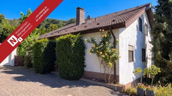 Immobilie in Wartenberg-Rohrbach - Split-Level-Architektenhaus mit Einliegerwohnung und uneinsehbarem Garten - Bild 0