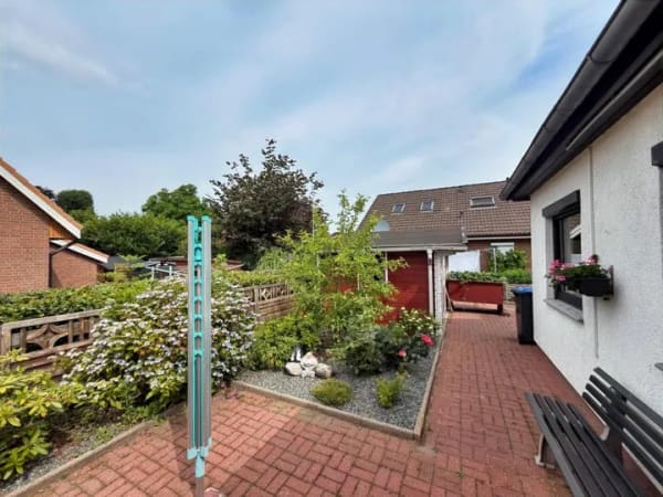 Immobilie in Hohn - Großzügiges Zuhause mit Kamin, Garten und Solaranlage - Bild 4