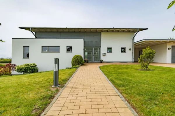 Immobilie in Bergenhusen - Designhaus mit Panoramablick – Zeitlose Architektur mit unverbaubarem Weitblick in Bergenhusen - Bild 1