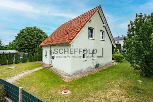 Immobilie in Holzgünz - Wohlfühlambiente! Stilvolles Einfamilienhaus in ruhiger Lage mit Garten und idealer Raumaufteilung - Bild 1
