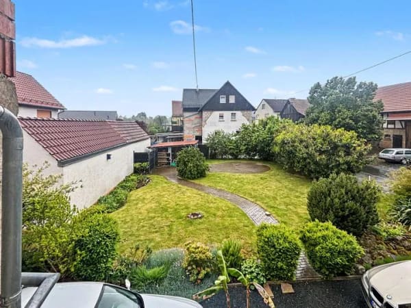 Immobilie in Grünberg - Grünberg-Lehnheim: Charmantes Einfamilienhaus mit großem Grundstück und Ausbaureserve - Bild 2
