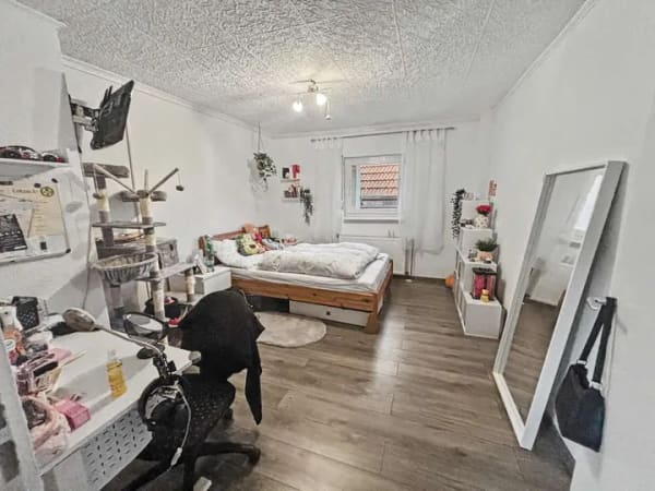 Immobilie in Grünberg - Grünberg-Lehnheim: Charmantes Einfamilienhaus mit großem Grundstück und Ausbaureserve - Bild 4