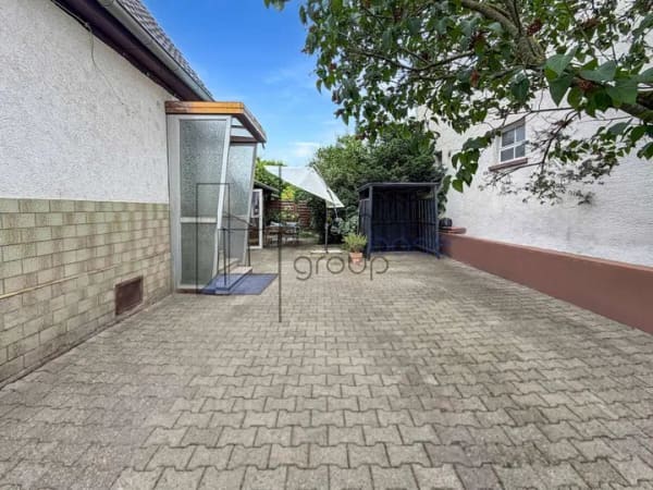 Immobilie in Lampertheim - Einfamilienhaus mit großzügigem Garten und Entwicklungspotenzial - Bild 1