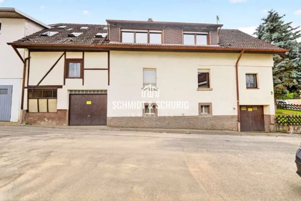 Immobilie in Königsbach-Stein - Einfamilienhaus mit Garten, Scheune und 2 Garagen in Königsbach-Stein - Bild 1