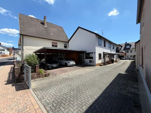Immobilie in Großheubach - Keine Käuferprovision! Kaufen Sie ab € 999,- mtl.* / ETW mit eigenem Dach & Carport - Bild 1