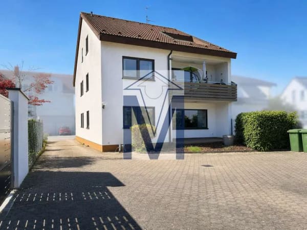 Immobilie in Neulußheim - 3-Familienhaus mit freier Erdgeschosswohnung, laufenden Mieteinnahmen und 4 Garagen - Bild 0