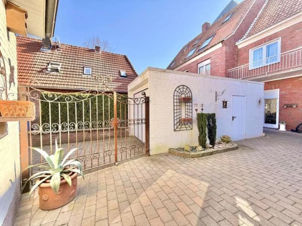 Immobilie in Südlohn - Zweifamilienhaus  Reihenhaus mit Potenzial für Wohnbebauung im Herzen von Südlohn - Bild 1