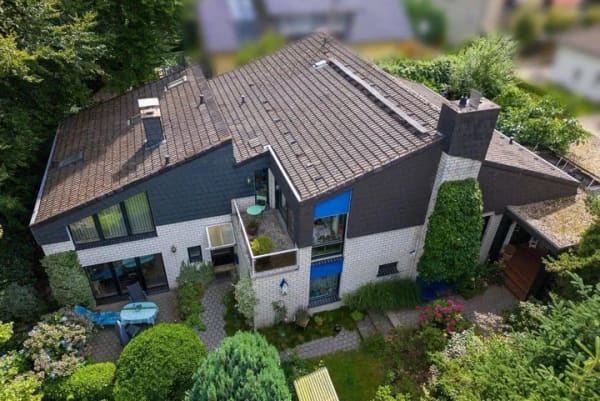 Immobilie in Tecklenburg - Exklusives Architektenhaus am Kurpark - individuelles Wohnen mit vielfältigen Nutzungsmöglichkeiten! - Bild 1