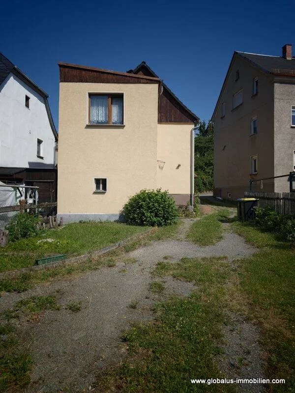 Immobilie in Mohlsdorf-Teichwolframsdorf - Solides Einfamilienhaus mit viel Stauraum und Ausbaupotenzial - Bild 1