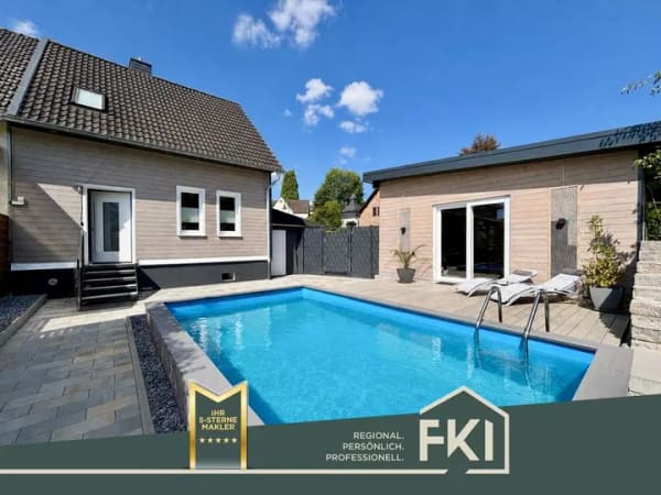 Immobilie in Wallmenroth - **Modernisierte Doppelhaushälfte mit Garage und Pool in Wallmenroth** - Bild 0