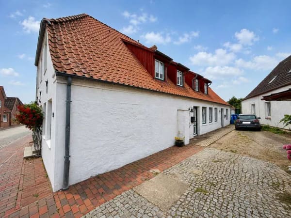 Immobilie in Lunden - Attraktive Kapitalanlage - Vollvermietetes Mehrfamilienhaus in Lunden! - Bild 1