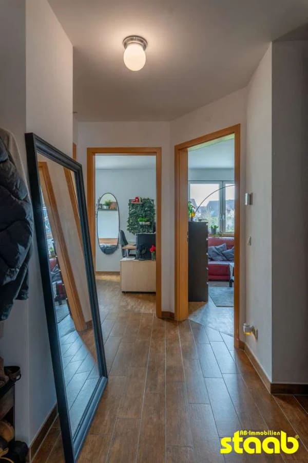 Immobilie in Niedernberg - Außergewöhnliche Eigentumswohnung im "Haus-im-Haus"-Konzept – Modernes Wohnen mit eigenem Garten - Bild 1
