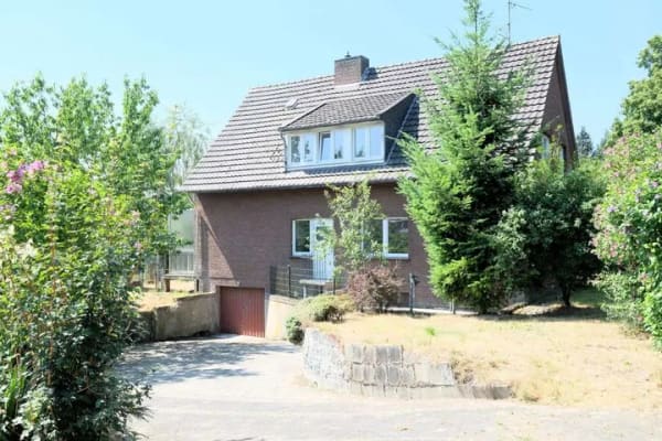 Immobilie in Kranenburg - Charmantes Zweifamilienhaus mit Garten, Garage und freiem Feldblick - Bild 0