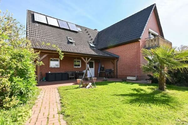 Immobilie in Börgerende-Rethwisch - Platz für die ganze Familie! Gemütliches Ein-/Zweifamilienhaus in Feldrandlage! - Bild 0