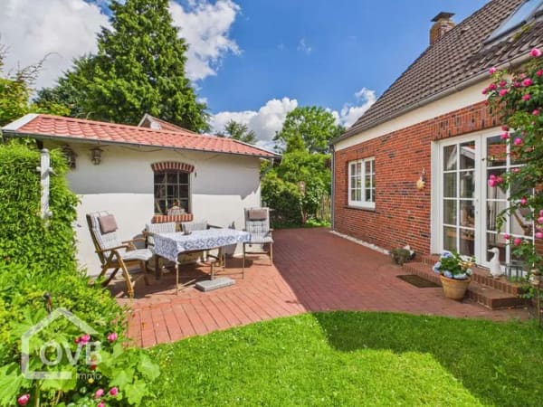 Immobilie in Krummhörn - Romantische Doppelhaushälfte in Loquard – liebevoll modernisiert & bezugsbereit - Bild 1
