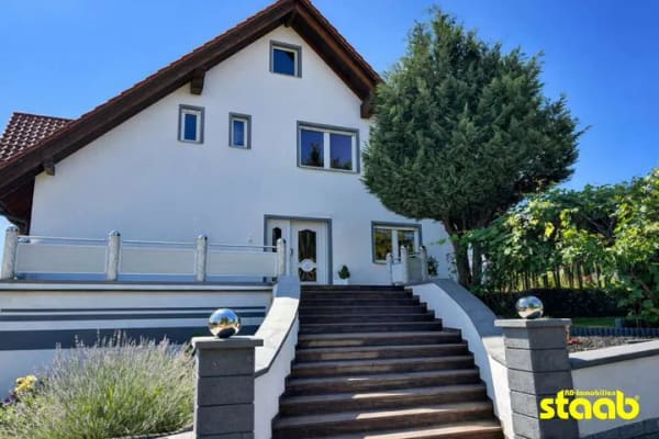 Immobilie in Schöllkrippen - Einfamilienhaus mit Einliegerwohnung, Garage & traumhaftem Garten - Bild 0