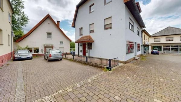 Immobilie in Warburg - Kapitalanlage mit 2 Wohneinheiten, Gewerbe und Entwicklungspotenzial - Bild 1