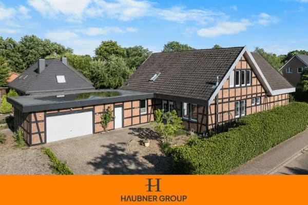 Immobilie in Beverstedt - Ein Haus für Generationen – Raumwunder in Beverstedt mit Einliegerwohnung und Vollkeller - Bild 0