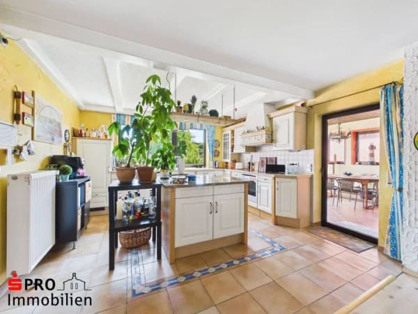 Immobilie in Merchweiler - Großzügiges Zwei- bis Dreifamilienhaus mit großem Garten - Bild 4