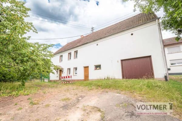 Immobilie in Vinningen - SANIERUNGSOBJEKT - freistehendes Einfamilienhaus mit Garage und Scheune im Ortskern von Vinningen! - Bild 0