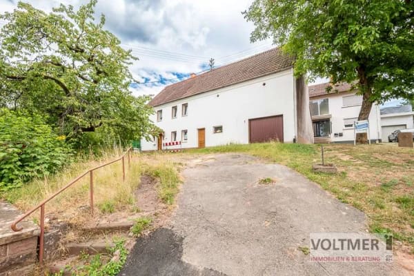 Immobilie in Vinningen - SANIERUNGSOBJEKT - freistehendes Einfamilienhaus mit Garage und Scheune im Ortskern von Vinningen! - Bild 1