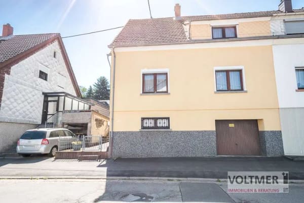 Immobilie in Schiffweiler - FAMILIENFREUNDLICH - Ein- bis Zweifamilienhaus mit Garage & Garten in ruhiger Lage von Schiffweiler! - Bild 0