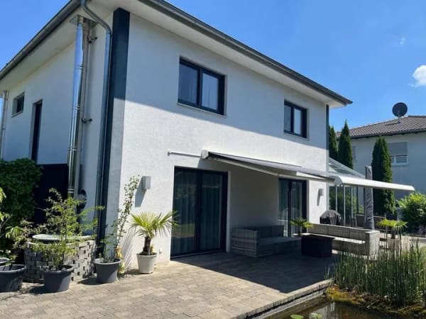 Immobilie in Schwendi - Modernes Einfamilienhaus mit Wintergarten, Doppelgarage und liebevoll angelegtem Garten in Schwendi - Bild 3