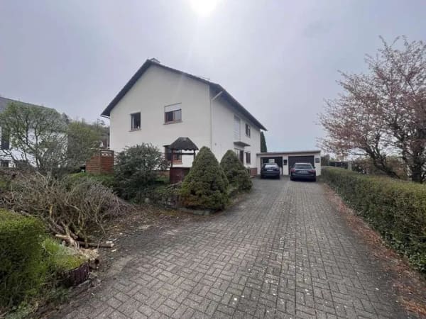 Immobilie in Schöntal - Gepflegtes Zweifamilienhaus mit großem Garten, zwei Garagen und viel Potenzial in Marlach - Bild 2