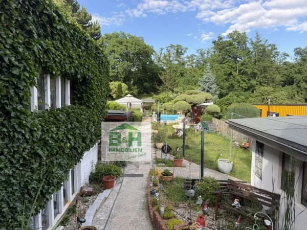 Immobilie in Bitterfeld-Wolfen - Kapitalanlage mit 6,7 % Bruttorendite – vermietete Doppelhaushälfte auf 980 m² Grundstück - Bild 1
