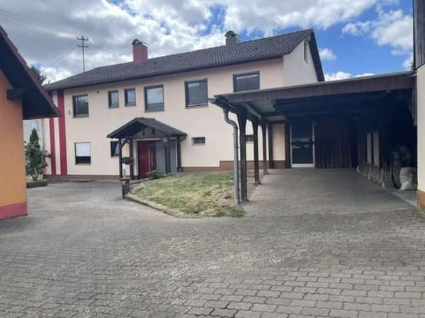 Immobilie in Schondra - Anwesen mit Einfamilienhaus inkl. ELW & zweitem Wohnhaus, Garagen, Carport, Scheune & Werkstatt - Bild 0