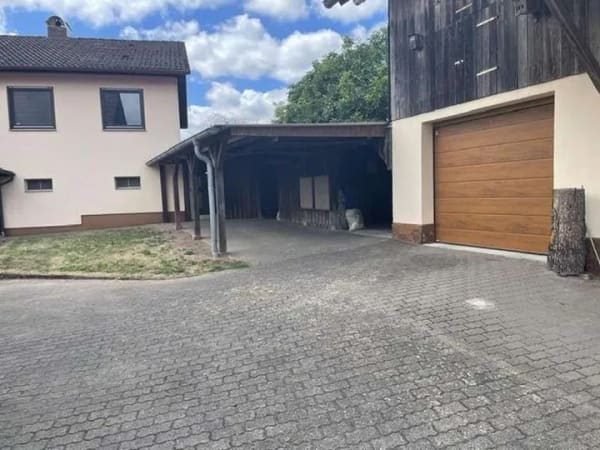 Immobilie in Schondra - Anwesen mit Einfamilienhaus inkl. ELW & zweitem Wohnhaus, Garagen, Carport, Scheune & Werkstatt - Bild 1