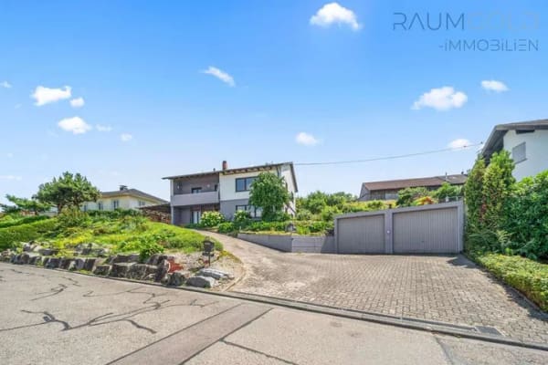 Immobilie in Bad Bellingen - Charmantes Einfamilienhaus mit großem Grundstück und ruhiger Lage in Rheinweiler - Bild 1