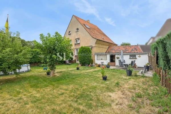 Immobilie in Bönen - Charmante Doppelhaushälfte mit Garten und Potenzial zur individuellen Modernisierung - Bild 0