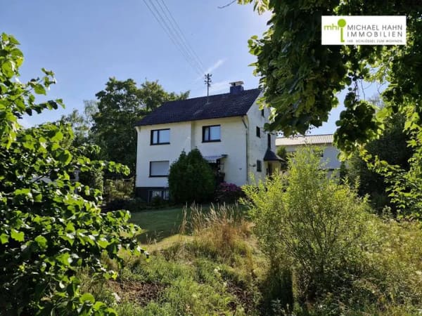 Immobilie in Much - Much Wellerscheid: Zweifamilienhaus mit Garage und Carport - Bild 0
