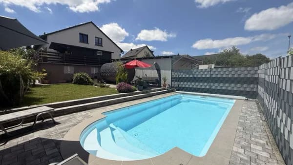 Immobilie in Appenheim - Modernes Ein- bis Zweifamilienhaus mit Pool, Sauna und großzügigem Grundstück in Appenheim - Bild 1