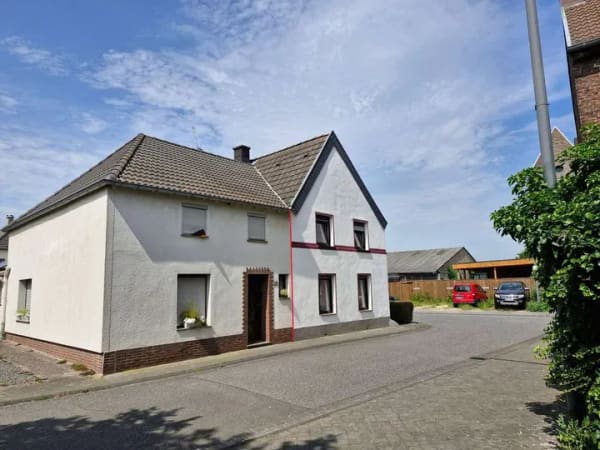 Immobilie in Inden - Inden-Schophoven: Kompaktes Einfamilienhaus mit einer Einzelgarage in ruhiger Umgebung - Bild 1