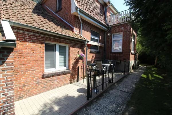 Immobilie in Westoverledingen - Ländliche gelegenes Wohnhaus mit zwei vermieteten WE, großem Grundstück und Scheune! - Bild 3