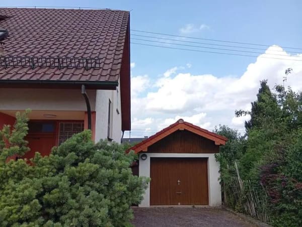 Immobilie in Osterburken - Charmantes Einfamilienhaus mit großem Garten in Osterburken - viel Platz für die ganze Familie - Bild 1