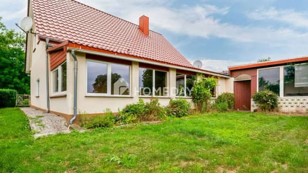 Immobilie in Thedinghausen - Familienfreundliches Einfamilienhaus mit großem Grundstück, Werkstatt & vielen Nutzungsmöglichkeiten - Bild 2