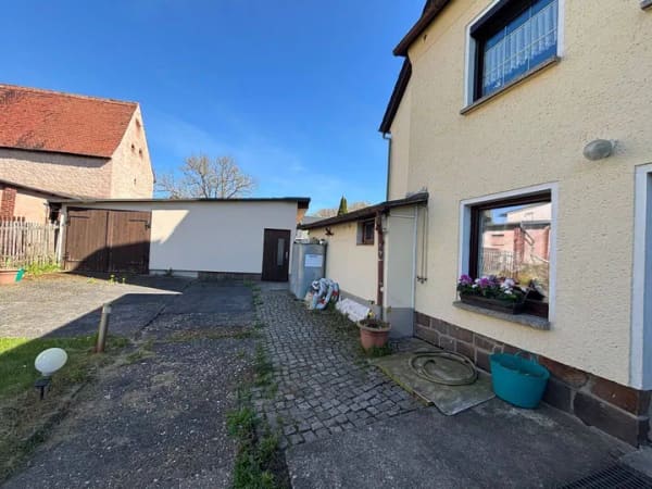 Immobilie in St. Egidien - Einfamilienhaus mit Büroeinheit im Erdgeschoss und reichlich Lagerflächen - Bild 1