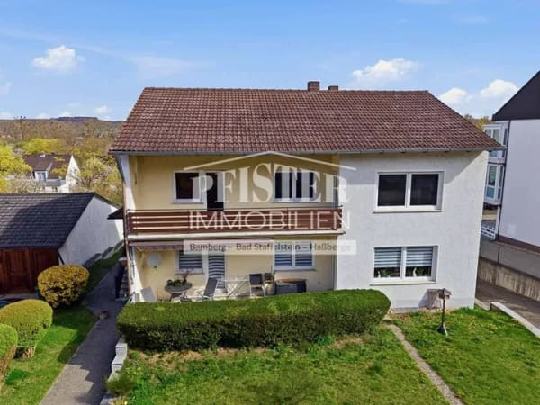 Immobilie in Viereth-Trunstadt - Ein Zuhause mit Zukunft: Zweifamilienhaus in Viereth mit großem Garten - Bild 0