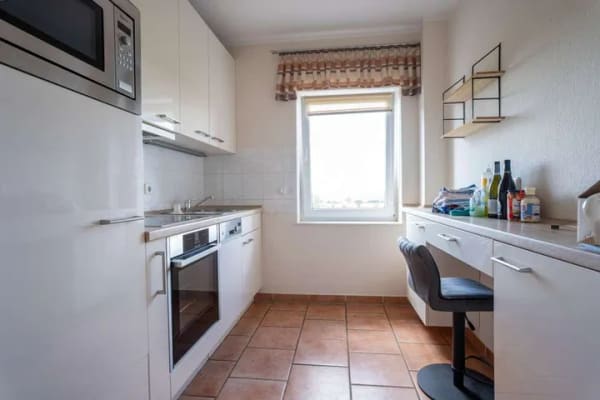 Immobilie in Heuerßen - Fernblick inklusive: Gepflegte 3,5-Zimmer-Eigentumswohnung mit Balkon, Aufzug & EBK - Bild 1