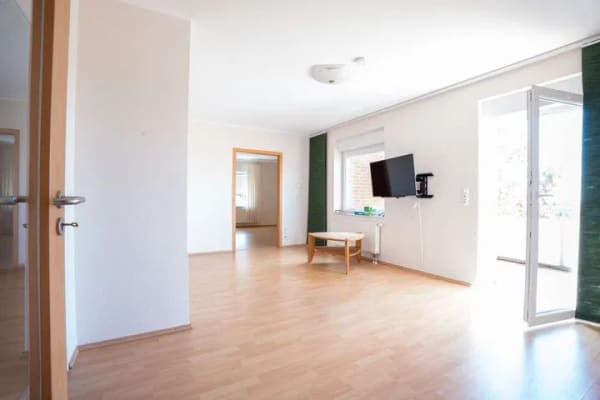 Immobilie in Heuerßen - Fernblick inklusive: Gepflegte 3,5-Zimmer-Eigentumswohnung mit Balkon, Aufzug & EBK - Bild 4