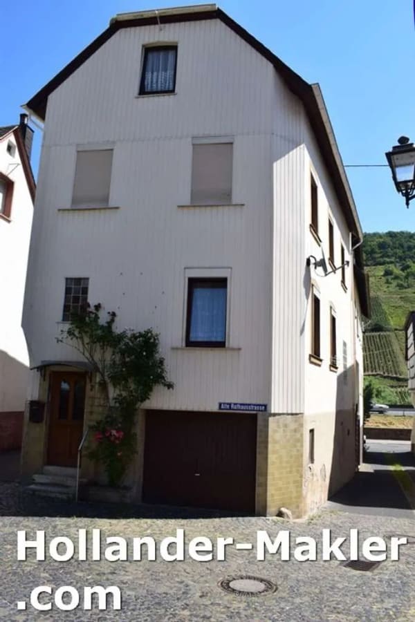 Immobilie in Briedel - Charmantes Einfamilienhaus mit viel Potenzial im idyllischen Weinort Briedel - Bild 1
