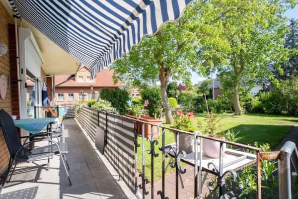 Immobilie in Heuerßen - Vermietete 3-Zimmer-Eigentumswohnung mit großem Balkon und Zugang zum Gemeinschaftsgarten - Bild 0