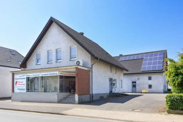 Immobilie in Bünde - Einfamilienhaus mit Ladeneinheit in zentraler Lage von Holsen - Bild 0