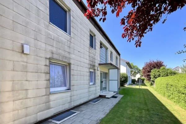 Immobilie in Kirchheim bei München - AIGNER - Kirchheim bei München: Gepflegtes Mehrfamilienhaus bestehend aus 6 Einheiten - Bild 1